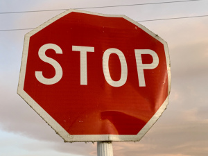 Red and white traffic stop sign