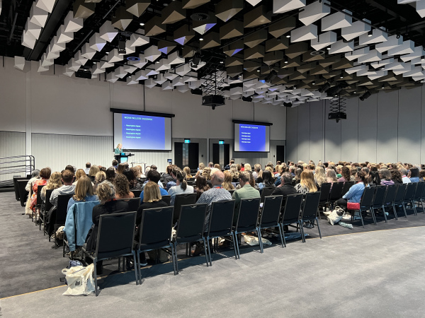 Conference audience listening to the keynote speaker